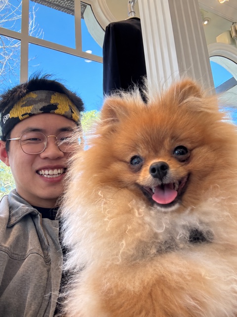 Yi Zeng with a dog